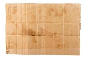 rectangular blank flat dirty sheet of cardboard - mockup for homeless placard, isolated on white background photo