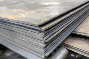 thick hot rolled steel sheets stack corner, close-up photo