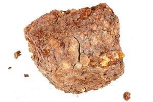 large piece of metallurgical ferrous iron stone ore isolated on whie background photo