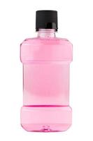 A plastic bottle of pink water mouthwash isolated on white background photo