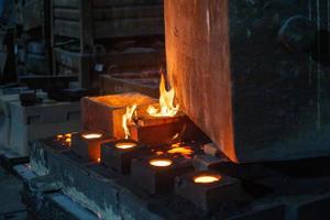 the chill mold cools down after pouring liquid steel photo