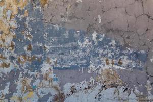 shabby weathered artistically peeled off blue and gray paint photo