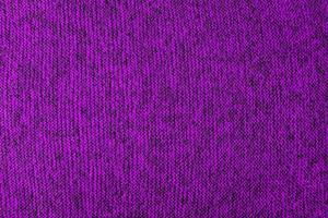 purple and black melange knitted texture and flat background photo