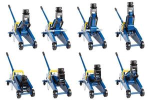 set of isolated blue hydraulic car jacks on white background raised in different heights photo