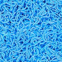 uncooked instant noodles seamless texture in cyan color photo