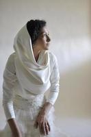 Portrait of a beautiful woman dressed as a bride photo