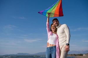 Couple enjoying time together at beach photo