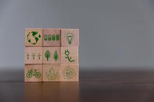 Companies are targeting net zero greenhouse gas emissions. Carbon credit concept.Tradable certificate to drive industry in direction of low emissions in efficiency cost. Wooden cubes with decrease CO2 photo