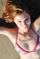 young woman relax  on beach photo