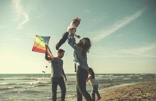 happy family enjoying vecation during autumn day photo