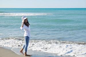 happy young woman on beach photo