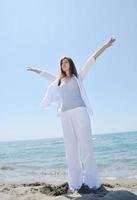 young woman relax  on beach photo