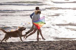 happy couple enjoying time together at beach photo