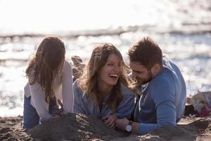 Young family enjoying vecation during autumn photo