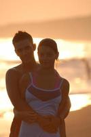 romantic couple on beach photo