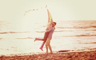 Couple enjoying time together at beach photo