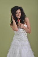 Portrait of a beautiful woman dressed as a bride photo