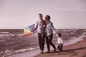happy family enjoying vecation during autumn day photo