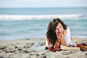 happy young woman on beach photo