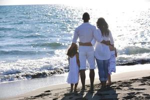 happy young  family have fun on beach photo