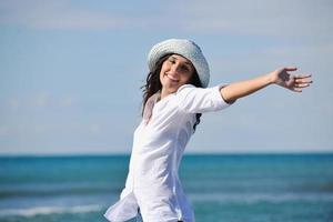 happy young woman on beach photo