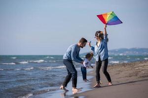 happy family enjoying vecation during autumn day photo