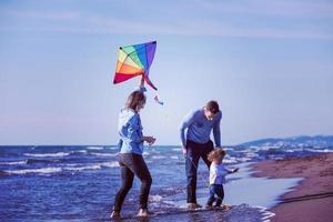 happy family enjoying vecation during autumn day photo