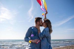 Couple enjoying time together at beach photo