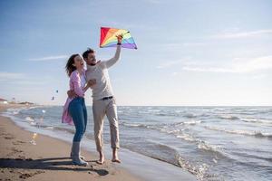 Couple enjoying time together at beach photo