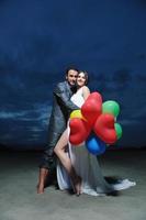 romantic beach wedding at sunset photo