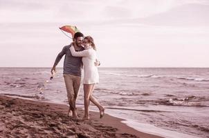 Couple enjoying time together at beach photo