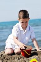 kids playing on beach photo