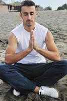 man yoga beach photo