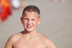 child at the beach photo