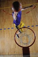 basket ball game player at sport hall photo