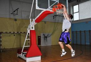 basket ball game player at sport hall photo