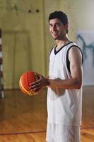 basket ball game player at sport hall photo