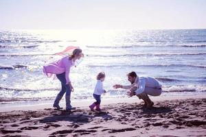 happy family enjoying vecation during autumn day photo