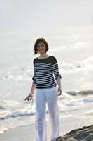 young woman relax  on beach photo