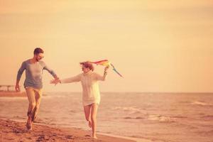Couple enjoying time together at beach photo