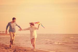 Couple enjoying time together at beach photo