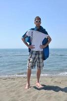 funny superhero standing on beach photo