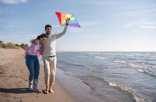 Couple enjoying time together at beach photo