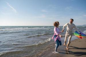 Couple enjoying time together at beach photo