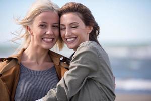 Women Smiling And Enjoying Life at Beach photo