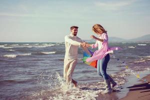 Couple enjoying time together at beach photo