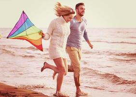 Couple enjoying time together at beach photo