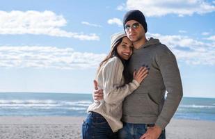 Couple chating and having fun at beach bar photo