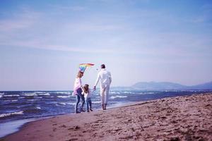 happy family enjoying vecation during autumn day photo