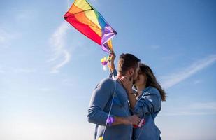 Couple enjoying time together at beach photo